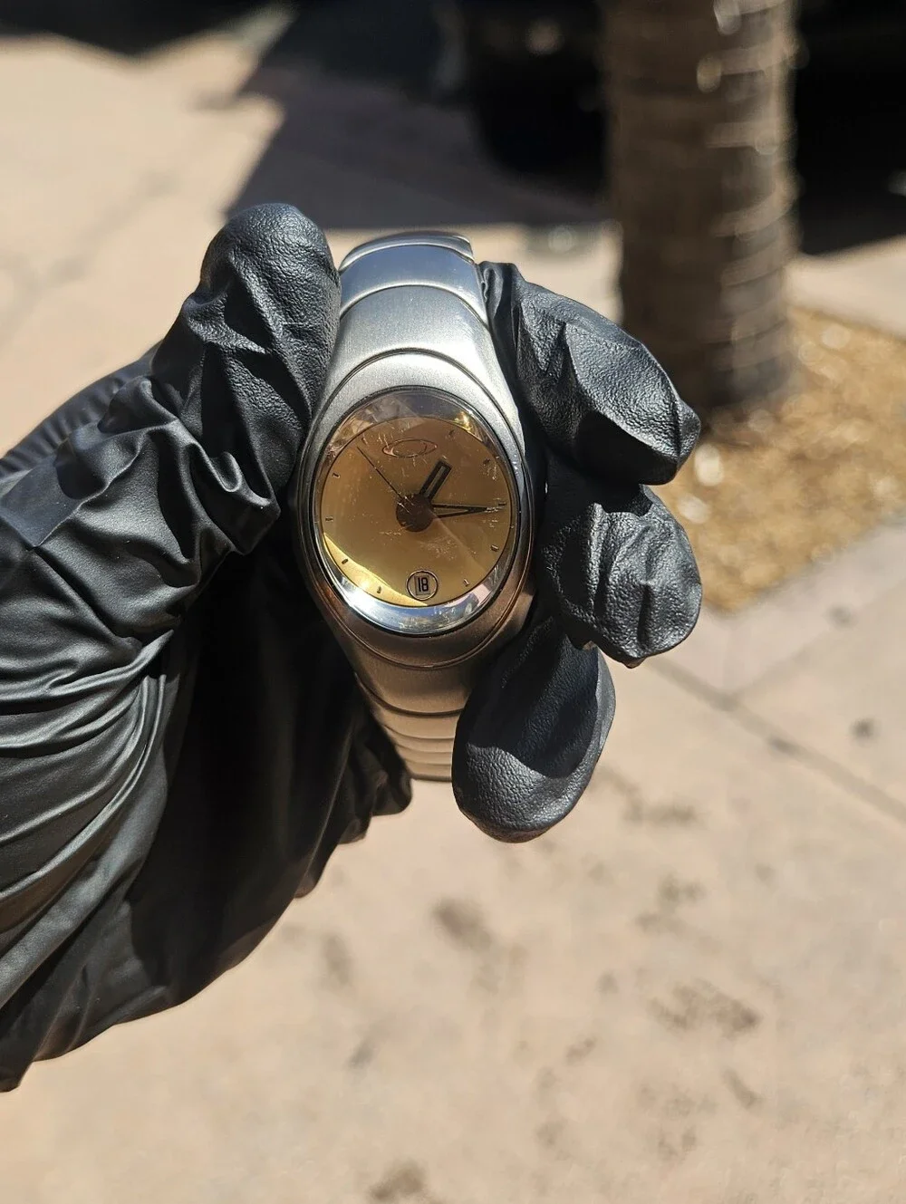 Oakley Timebomb Icon Titanium Watch with Gold Dial.